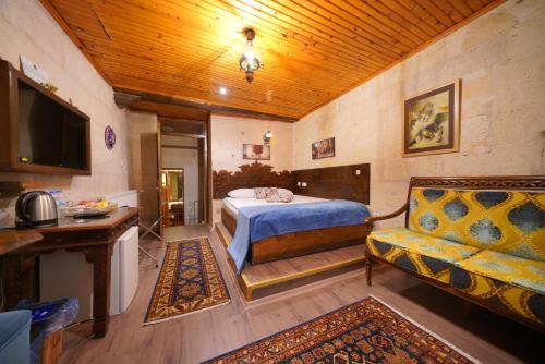 Mira Cappadocia Hotelにあるベッド
