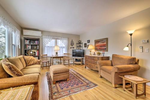 a living room with two couches and a tv at Hadley Vacation Rental 24 Mi to Springfield! in Hadley