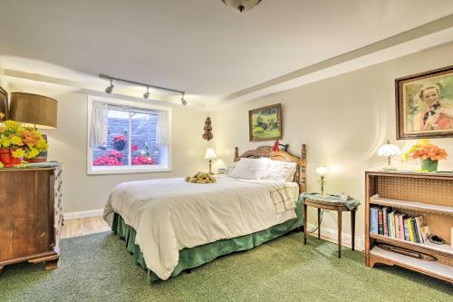 a bedroom with a large bed and a window at Hadley Vacation Rental 24 Mi to Springfield! in Hadley