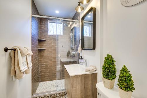 a bathroom with a shower and a sink at Lovely Highland Home with Pool and Hot Tub! in Highland