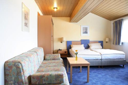 Katil atau katil-katil dalam bilik di Hotel Harsshof