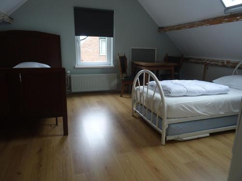 Katil atau katil-katil dalam bilik di Kustverhuur, Breskens, 't Zandertje