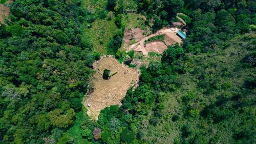 an aerial view of an island in the middle of a forest at Bambara Ella Agro Resort & Camping in Haputale