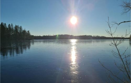 a large body of water with the sun in the sky at 3 Bedroom Awesome Home In Sävsjö in Gistingstorp