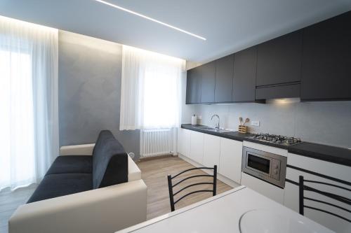 Kuchyň nebo kuchyňský kout v ubytování Casa Vacanze Residence Trifoglio