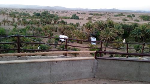 a view of the desert from the balcony of a house at café restaurant Bivouac relax in Bou Dib