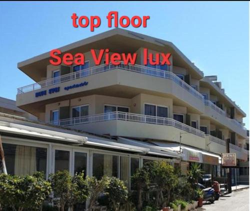 a top floor of a sea view hotel at BLUE EYES APARTMENTS in Ixia