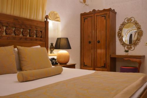Mira Cappadocia Hotelにあるベッド