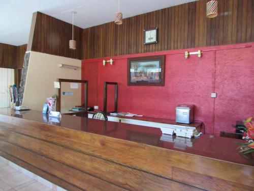 The lobby or reception area at Equator Hotel