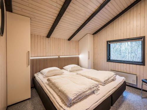 Postel nebo postele na pokoji v ubytování Holiday home Nørre Nebel LXXIV