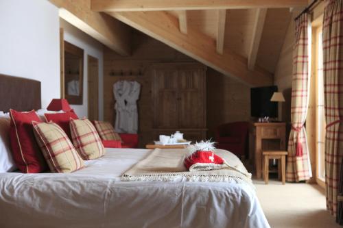 เตียงในห้องที่ Mountain Lodge, Les Crosets