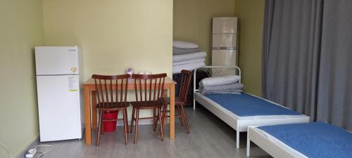 Postel nebo postele na pokoji v ubytování Hans House