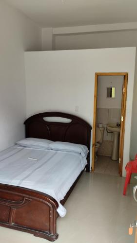 Postel nebo postele na pokoji v ubytování Casa Hospedaje