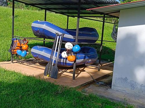 a blue slide with a stuffed animal on it at OYO Home 90737 Disan Baang Kiulu in Ranau