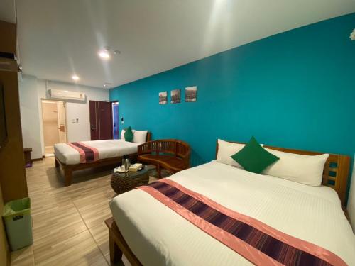Cama o camas de una habitación en Kenting Sin Sin Hotel