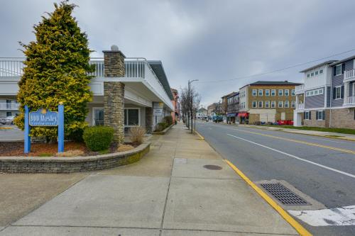 an empty street in a small town with buildings at Ocean City Condo with Pool Walk to Boardwalk! in Ocean City