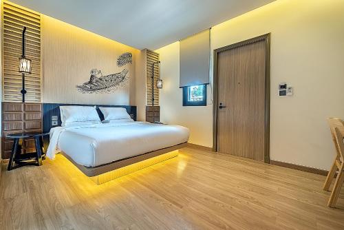 Cama o camas de una habitación en Phra Nakhon Poshtel
