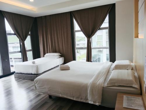 Postel nebo postele na pokoji v ubytování TOWERMAS HOTEL