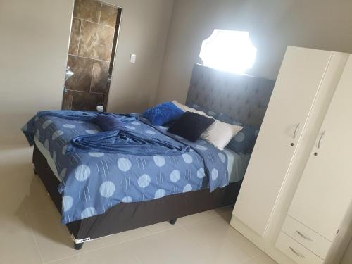 Postel nebo postele na pokoji v ubytování Gardenia Guesthouse