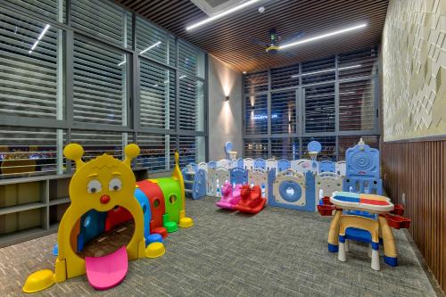 a childrens play room with many toys in it at Maris Hotel Nha Trang in Nha Trang