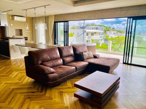Coin salon dans l'établissement CONDOMINIUM 紅-BIN-