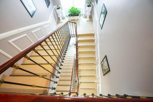 an overhead view of a staircase in a house at Hôtel Parisien in Nice