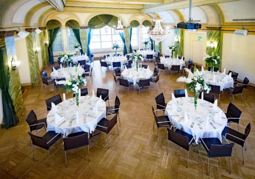an overhead view of a banquet hall with tables and chairs at Hotel Klaus K in Helsinki
