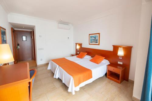Letto o letti in una camera di Hotel Risech