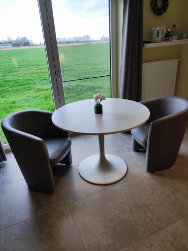 Posezení v ubytování B&B Het Polderhof
