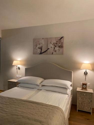 Postel nebo postele na pokoji v ubytování Casa L'Andrunèl