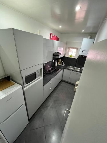 Dapur atau dapur kecil di Appartement LE ROYAL.
