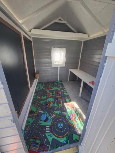 an inside view of a small room with a rug on the floor at Schöne Wohnungen in Schwandorf in Schwandorf in Bayern