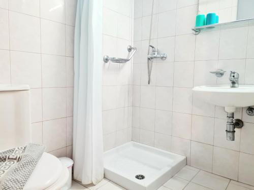Un baño de G92 City Hotel