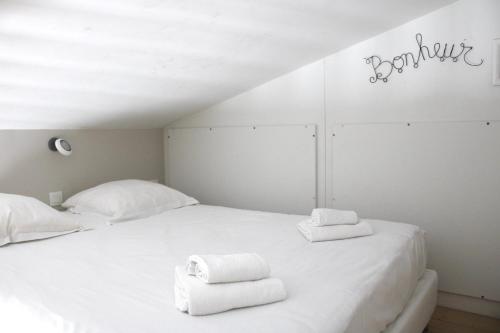 Letto o letti in una camera di Fleur de Ré