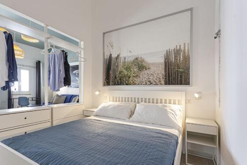 Кровать или кровати в номере Dimore al mare-Stelladelmare Fontanebianche