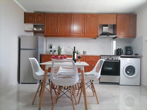 Kuchyň nebo kuchyňský kout v ubytování Sunrise Apartment 2