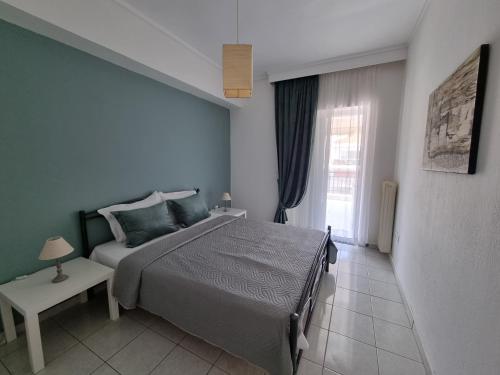 Ένα ή περισσότερα κρεβάτια σε δωμάτιο στο Casa Domenica