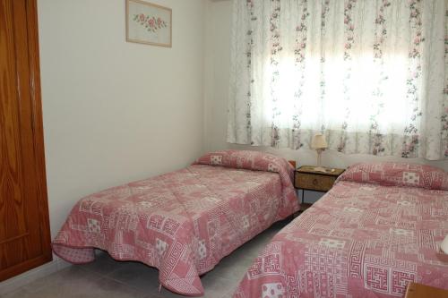 Postel nebo postele na pokoji v ubytování 165 Talima D-13 - Deniasol