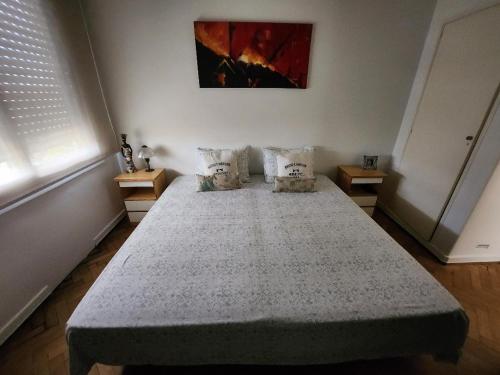 Ένα ή περισσότερα κρεβάτια σε δωμάτιο στο Confortable Habitacion en casa particular con baño compartido