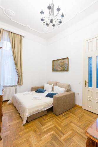 Ένα ή περισσότερα κρεβάτια σε δωμάτιο στο Residence Central Annapolis