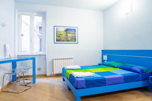 Postel nebo postele na pokoji v ubytování Banchi Centrale