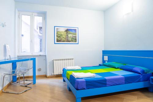 A bed or beds in a room at Banchi Centrale