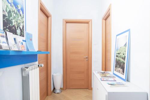 a room with a hallway with a door at Banchi Centrale in Riomaggiore