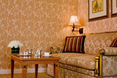 a living room with a couch and a table at Terelj Hotel & Spa in Ulaanbaatar