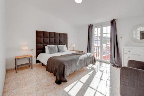 Кровать или кровати в номере Bonita Casa Nina