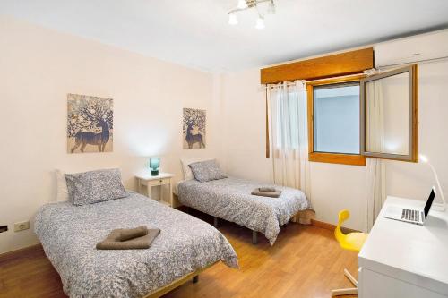 Кровать или кровати в номере Luz Home