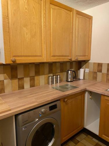 Η κουζίνα ή μικρή κουζίνα στο River Penthouse Apartment In The Heart