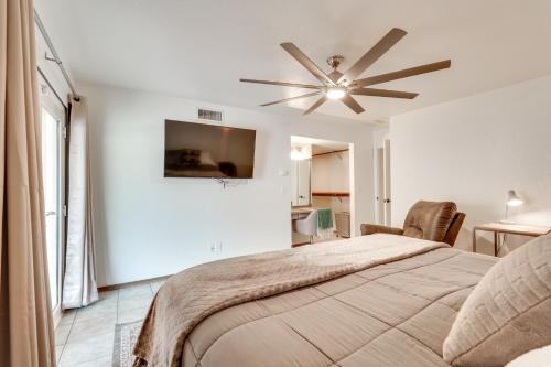 a bedroom with a bed and a ceiling fan at Lake Havasu Home with Private Patio and Views! in Lake Havasu City
