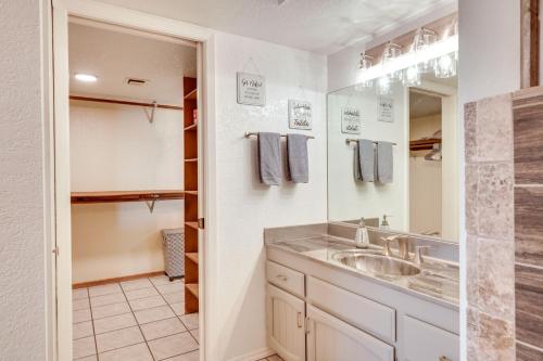 a bathroom with a sink and a mirror at Lake Havasu Home with Private Patio and Views! in Lake Havasu City