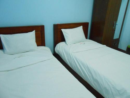Postel nebo postele na pokoji v ubytování Lucky Backpacker Hostel